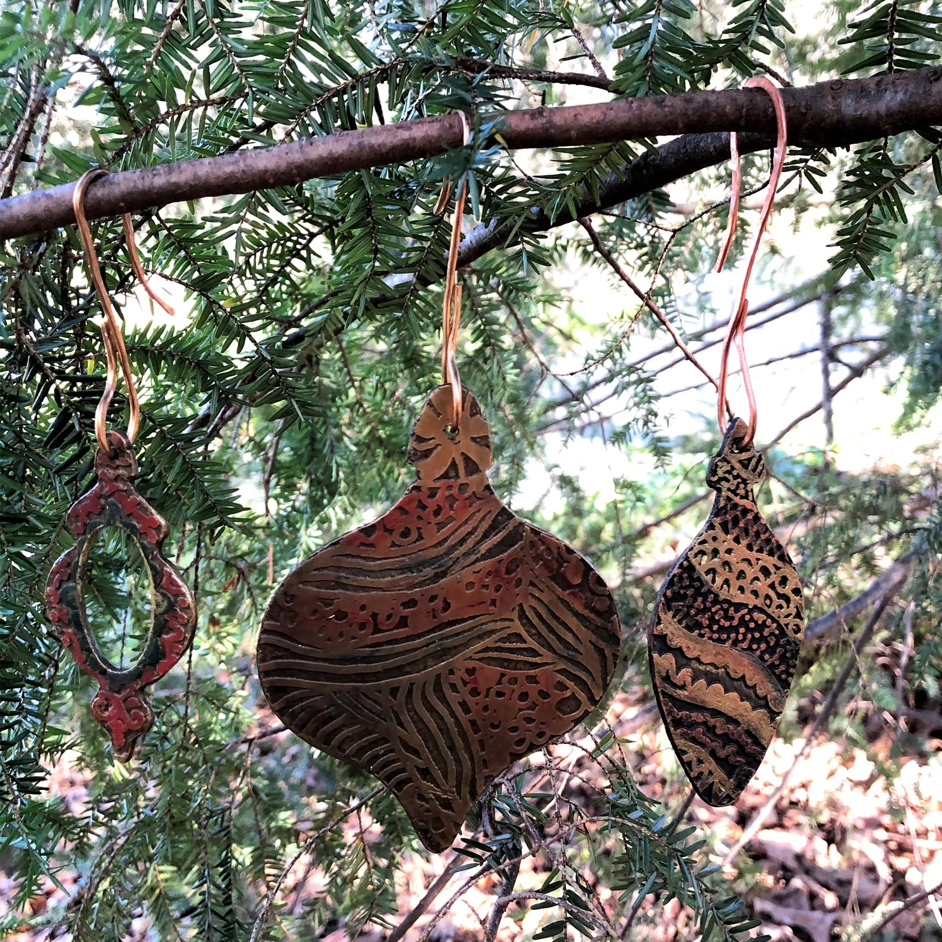 Custom Hand Drawn and Etched Holiday Ornaments in Red Brass, Copper and Silver Nickel