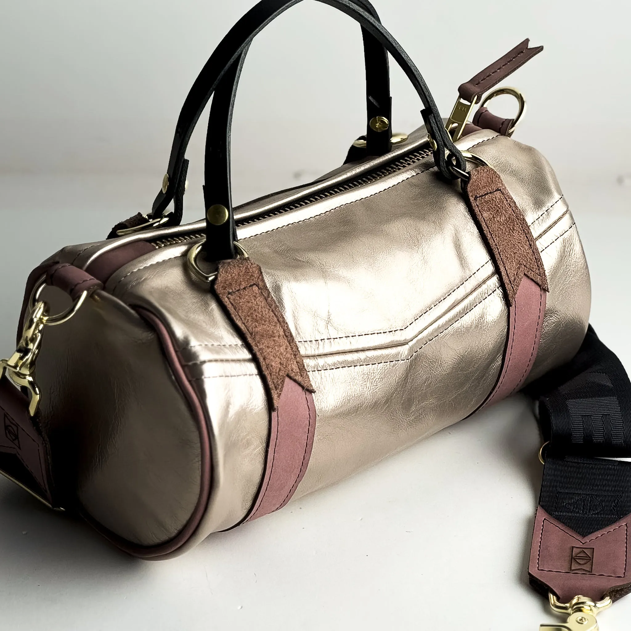 Urban Edge Collection | Gigi Baby Duffel   Crossbody | Distressed Pink Jade   Champagne Steel